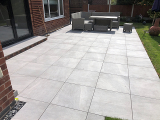 Porcelain patio by Paul Gibbons Landscapes Ltd